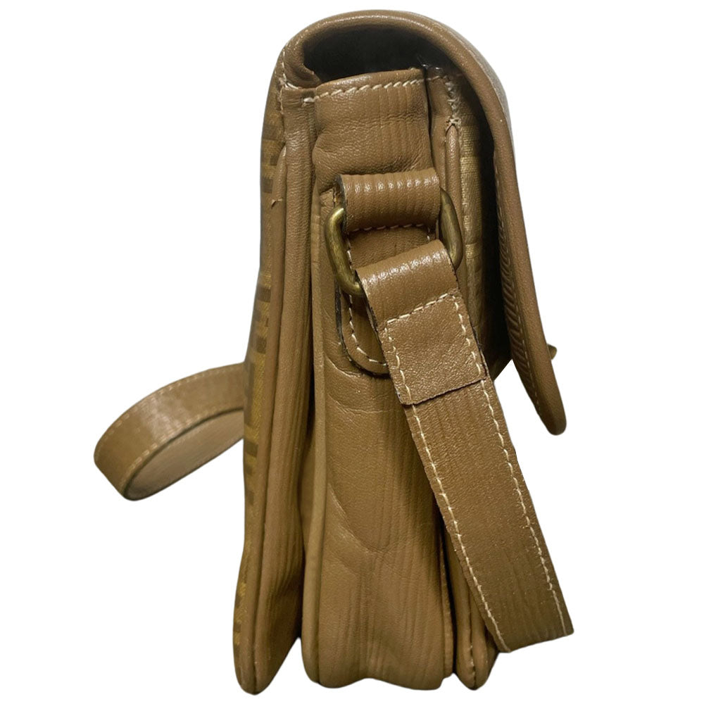 Fendi SAS circa 1970's tan and brown patent leather monogram FF Zucca print cross-body bag with front closure strap that wraps around bag and through brushed gold tone hardware. Long leather strap suitable to wear cross body, brown leather lining with three open interior sections and one zip pocket. Made in Italy 