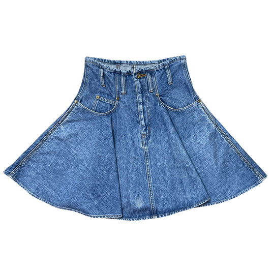 Fiorucci circa 90's high waisted flared light blue denim skirt with belt loops, front pockets with rivets, zip fly front closure with metal engraved logo button at top Fiorucci angel logo patch at back waist.