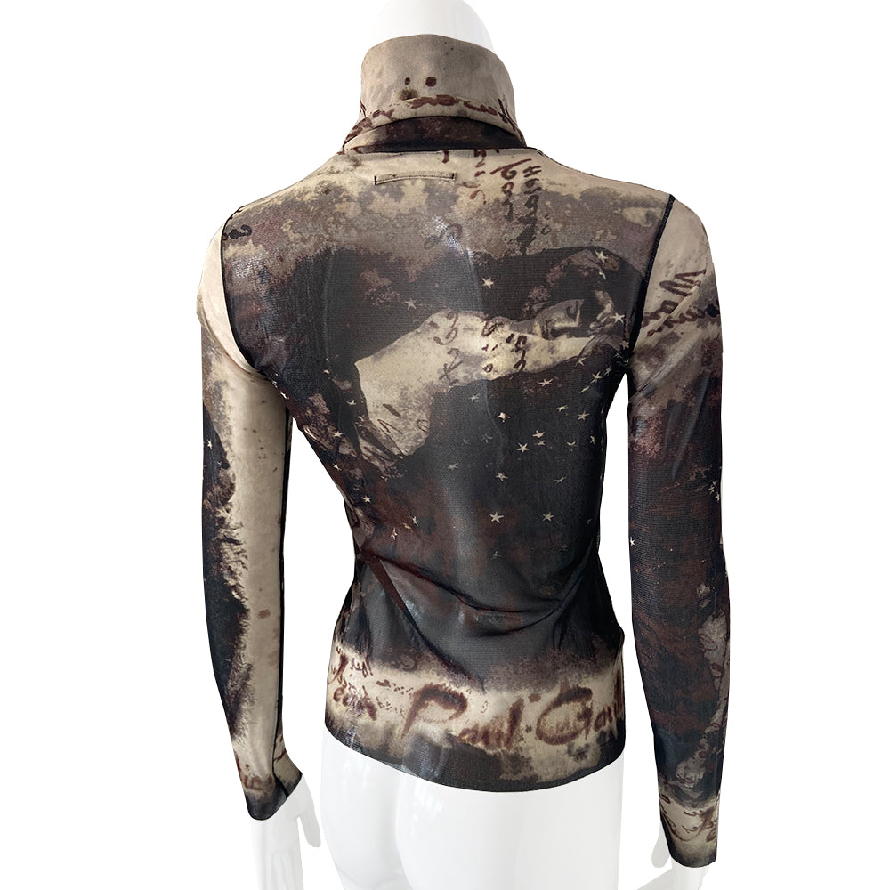 Jean Paul Gaultier brown, beige, burgundy long sleeve mesh turtleneck by Jean Paul Gaultier Femme, AW 2003 featuring reclining semi nude woman, floating stars and Jean Paul Gaultier signature on front, back and sleeves, black serged accent seams. Made in Japan 