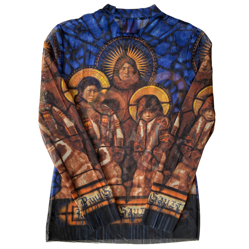 Jean Paul Gaultier stained glass saints mesh long sleeved top circa 1998 in blue, gold, tan. Front and back image a family of Saints on a background of stained glass with Jean Paul Gaultier printed along hemline and on sleeves. Tag size: 40. Made in Japan