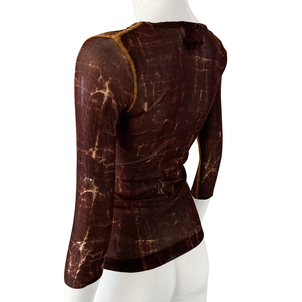 Jean Paul Gaultier Astrology mesh top by Jean Paul Gaultier Maille Classique, FW 1998. Three quarter sleeve mesh fabric featuring signs of the zodiac in front with yellow accent serge stitching at arms, side seams and neckline. Color: Brown/Multi. Made in Italy