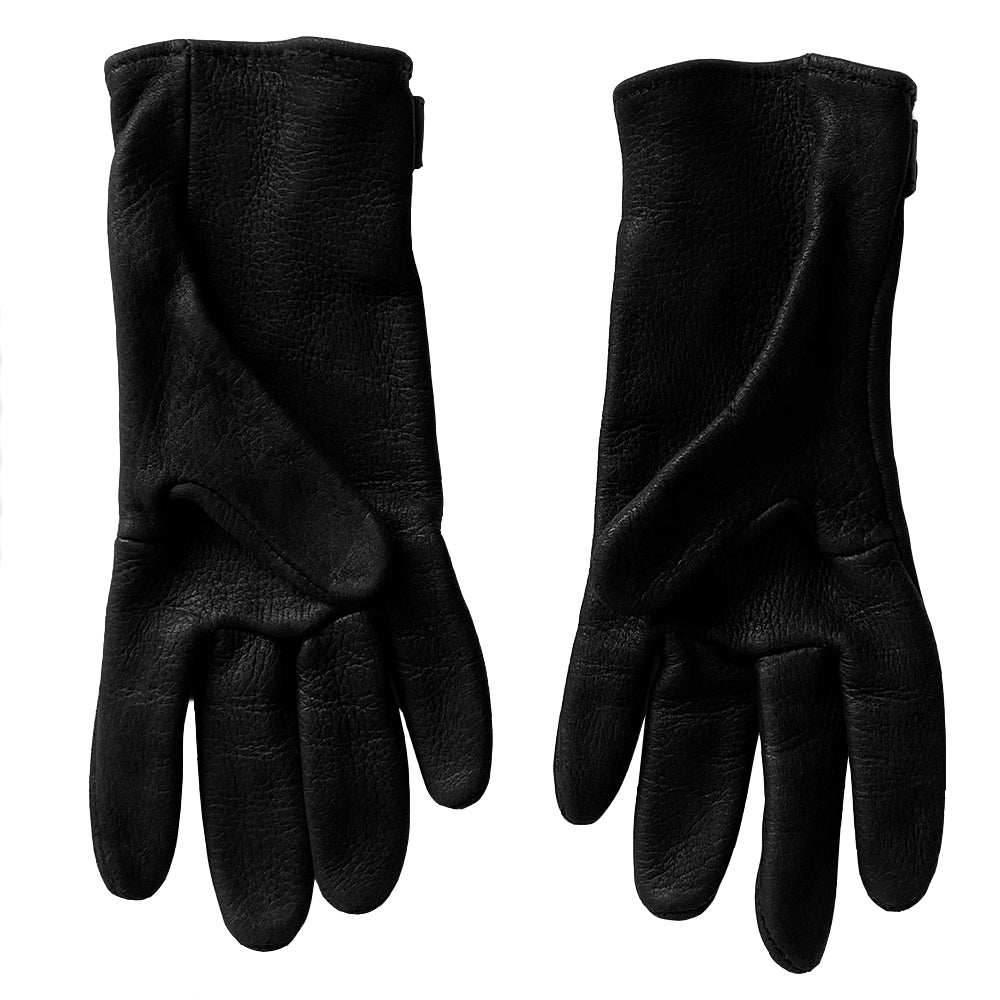 Chrome Hearts black size 7.5 leather gloves, circa mid 2000’s. Unlined with leather wrist strap and sterling silver logo snap button closure. Made in USA 