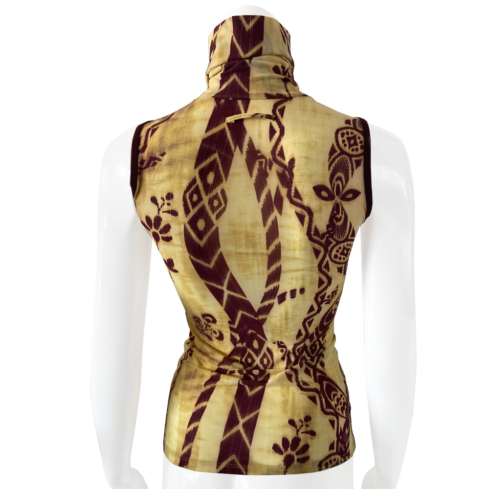 Polynesian print pastel yellow,burgundy mesh top by Jean Paul Gaultier, Jean Paul Gaultier label early 2000’s. Sleeveless, high neck tightly woven mesh fabric with Polynesian geometric and flower motifs, solid burgundy banded arm holes. Made in Japan 