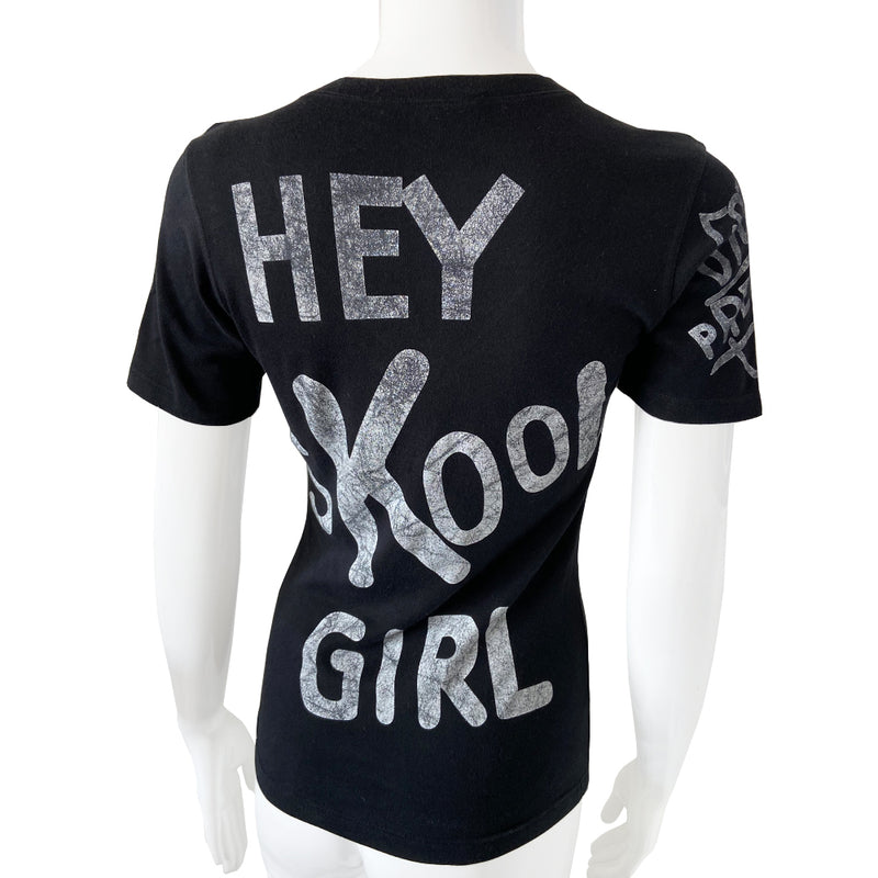Christian Dior Hey Skool Girl short sleeved V neck tee by John Galliano for Dior, 2004. I Heart Dior with heart and arrow in front, Hey Skool Girl in back and Dior Prefect on one sleeve. Color: Black with white print. Made in Italy