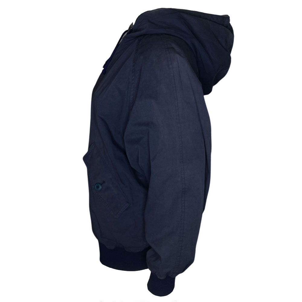 Issey Miyake by Tsumori Chisato navy zip hooded jacket with 2 front angled button flap pockets, ribbed cuffs and bottom hem, I.S. printed on back. Reversible with Interior lined in light grey jersey with two inner slip pockets. Made in Japan