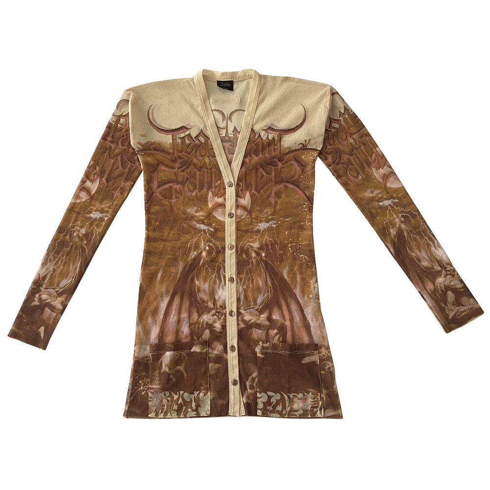 Jean Paul Demon rare beige and light brown cardigan from John Paul Gaultier Femme, 2001 in stretch mesh featuring winged demon on front and back and Jean Paul Gaultier name in gothic print with gold-tone button front closure, 2 patch style front pockets. 100% Polyamide Size: 40 Made in Japan 