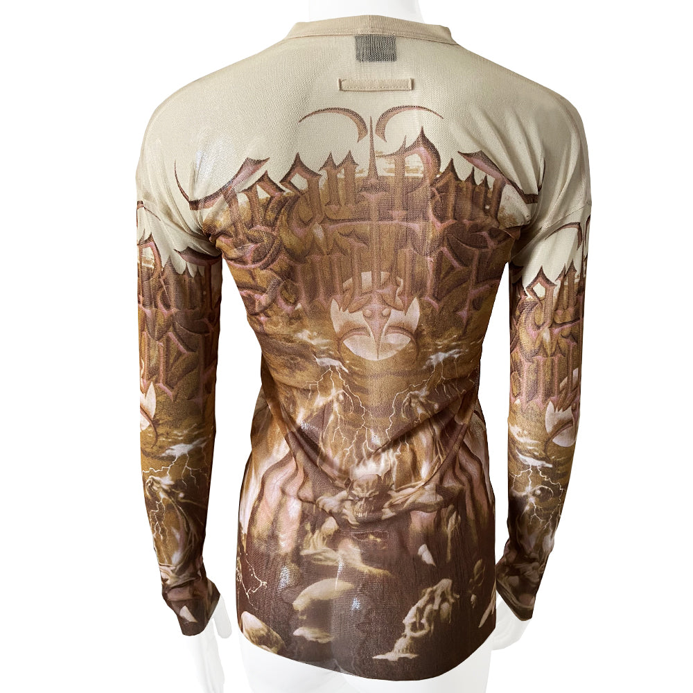 Jean Paul Demon rare beige and light brown cardigan from John Paul Gaultier Femme, 2001 in stretch mesh featuring winged demon on front and back and Jean Paul Gaultier name in gothic print with gold-tone button front closure, 2 patch style front pockets. 100% Polyamide Size: 40 Made in Japan 