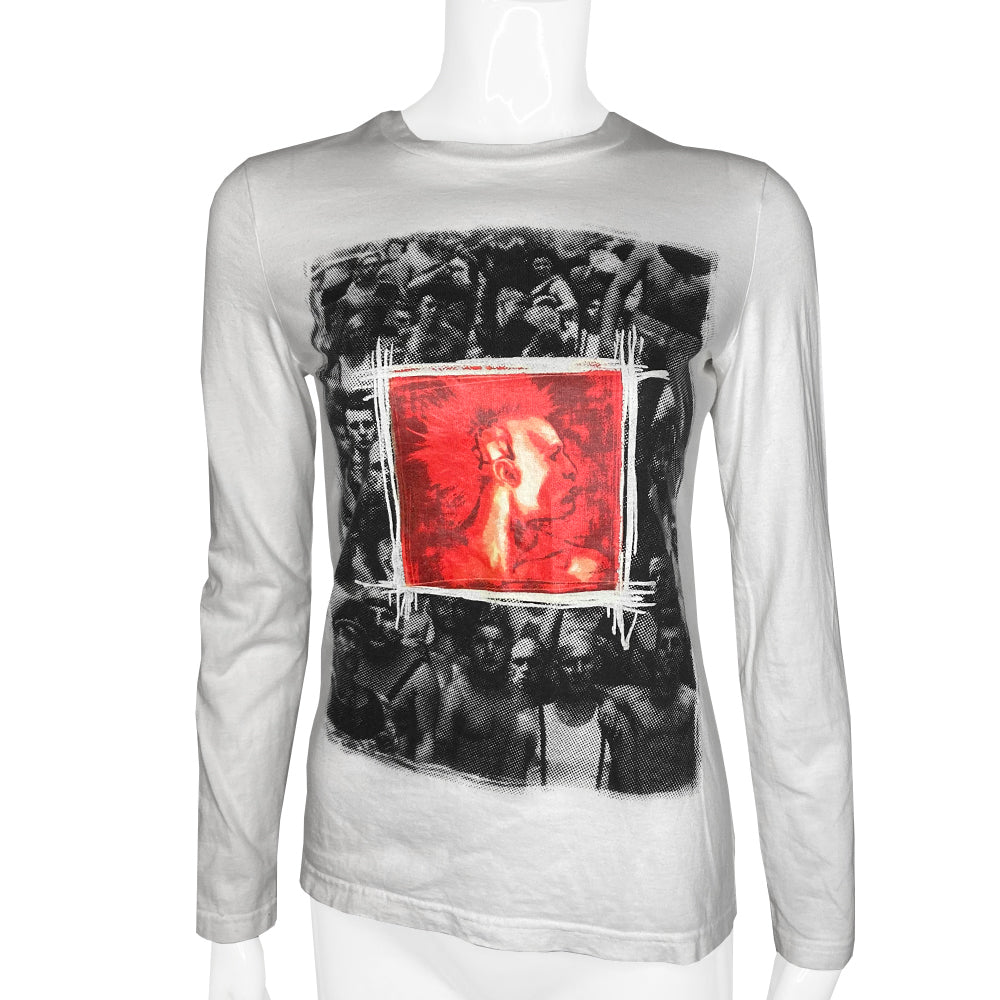 Jean Paul Gaultier Fight Racism Tee by Jean Paul Gaultier JPG label circa circa 1997. Crew neck long sleeved tee with framed punk profile image at front center over black and white photo Tag size: 40 Main Color: White with red, black, grey print 