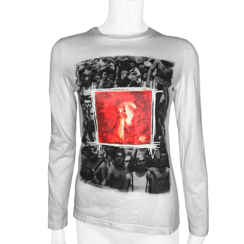 Jean Paul Gaultier Fight Racism Tee by Jean Paul Gaultier JPG label circa circa 1997. Crew neck long sleeved tee with framed punk profile image at front center over black and white photo Tag size: 40 Main Color: White with red, black, grey print 