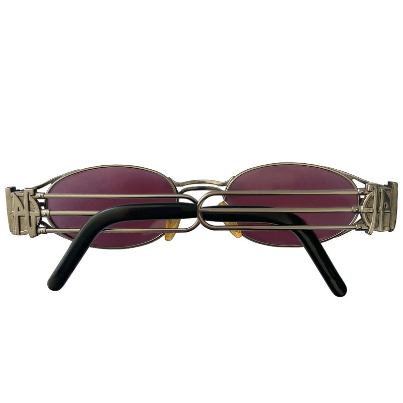 JPG oval rose lens 1990’s silver-tone metal frame sunglasses by Jean Paul Gaultier JPG 1990’s with triple bar arms attached to plastic ear piece and JPG logo at temples. 100% UV protection Style: 58-5102 Made in Japan