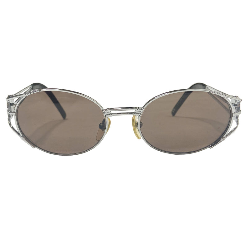 JPG oval lens 1990’s silver-tone metal frame sunglasses with brown lenses by Jean Paul Gaultier JPG with triple bar arms attached to plastic end piece and JPG logo at temples. 100% UV protection. Style: 58-5102 Made in Japan 