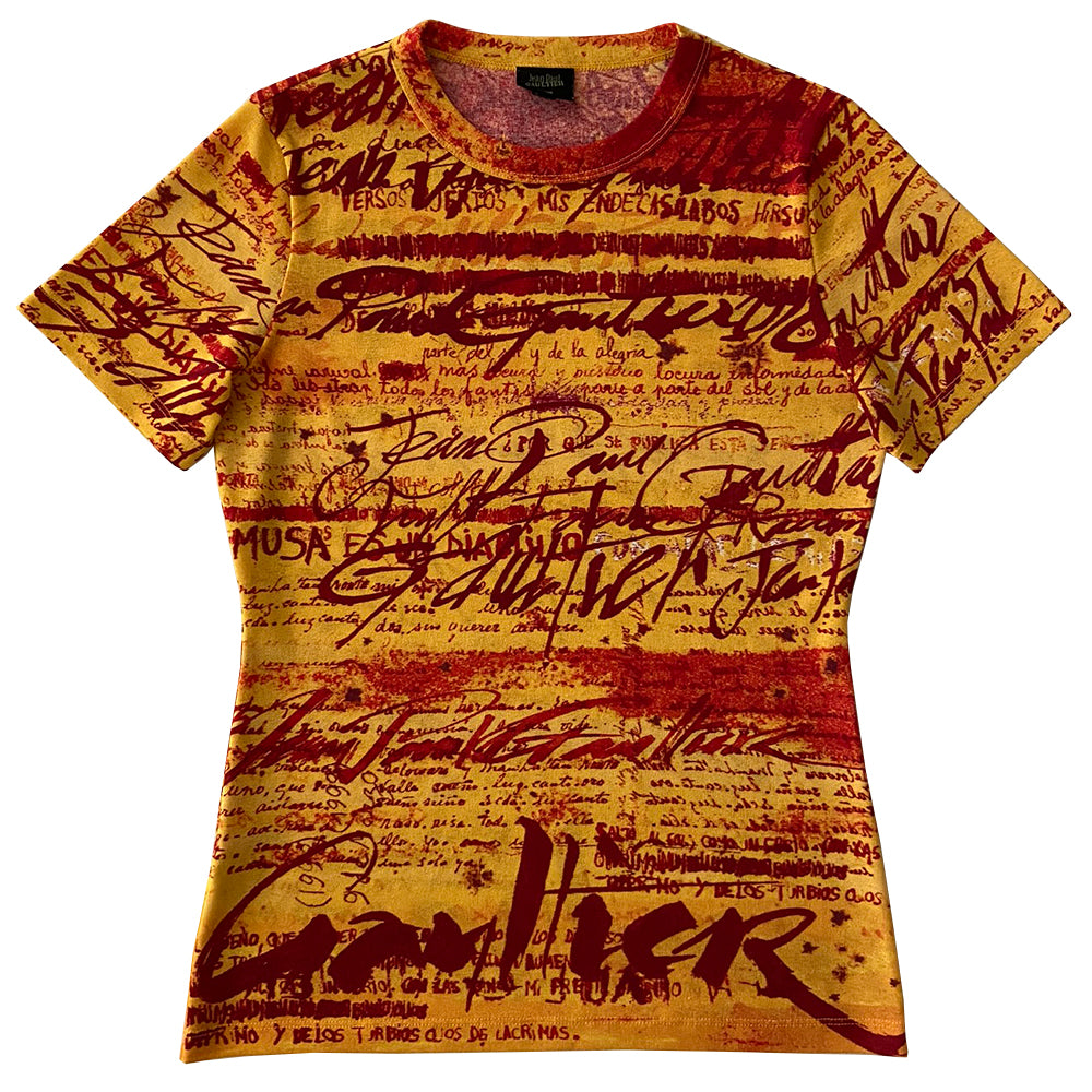 Jean Paul Gaultier yellow tight weave short sleeve mesh top Jean Paul Gaultier Femme, 1990’s featuring all over red graffiti style print. Tag size: 40 Fabric: 100% Polyamide. Made in Japan 