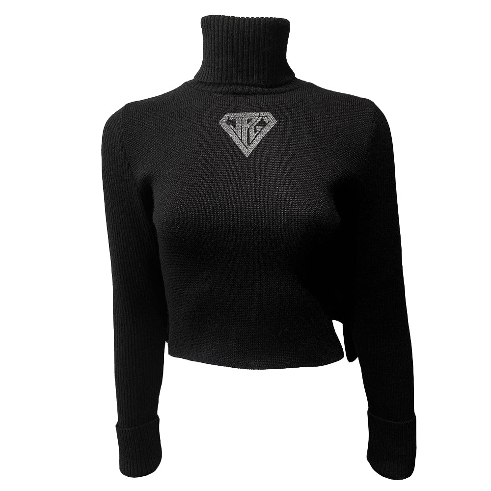 Jean Paul Gaultier cropped black wool turtleneck sweater circa 1990’s from JPG Paris label with with attached cape ribbed at neck and sleeve hems, JPG triangular logo at center chest. Made in Japan 