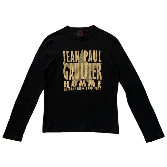 Jean Paul Gaultier long sleeve black logo tee from Jean Paul Gaultier Classique, FW 1999/2000 with Jean Paul Gaultier Automne Hiver 1999 2000 printed over silver-tone star. Tag size: 48 Made in Japan 