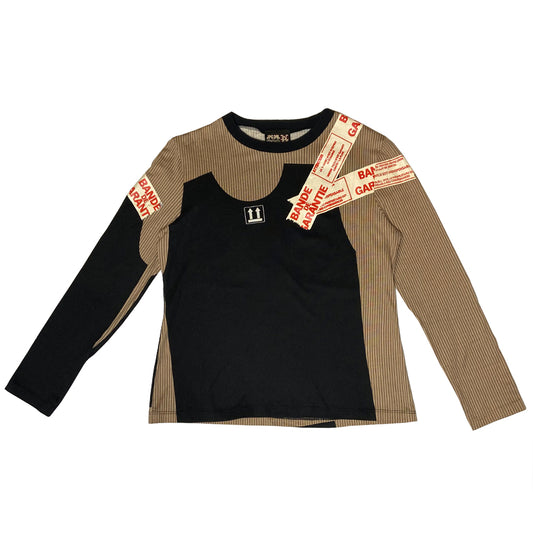 Jean Paul Gaultier, JPG label circa 90’s early 2000’s long sleeve beige pinstripe top with trompe l’oeil black tee shirt overlay and packing tape print in front and back. Tag size: 40 Main Colors: Brown, black. Made in Japan
