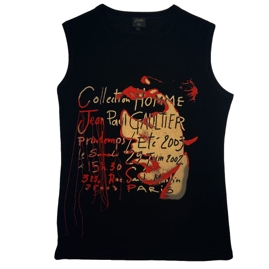 Jean Paul Gaultier face print tank  by Jean Paul Gaultier Homme, 2003.  Crew neck sleeveless tee with portrait, printed and cursive writing. Tag size: 48 Main Color: Black, red, neutral 