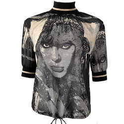 Jean Paul Gaultier 5th Element black and white mesh 3/4 sleeve top by Jean Paul Gaultier JPG 1997 with front and back portrait of Leeloo, knit mock collar and sleeve hems with white accent stripe. Elastic drawstring ties at bottom hemline. Made in Japan 
