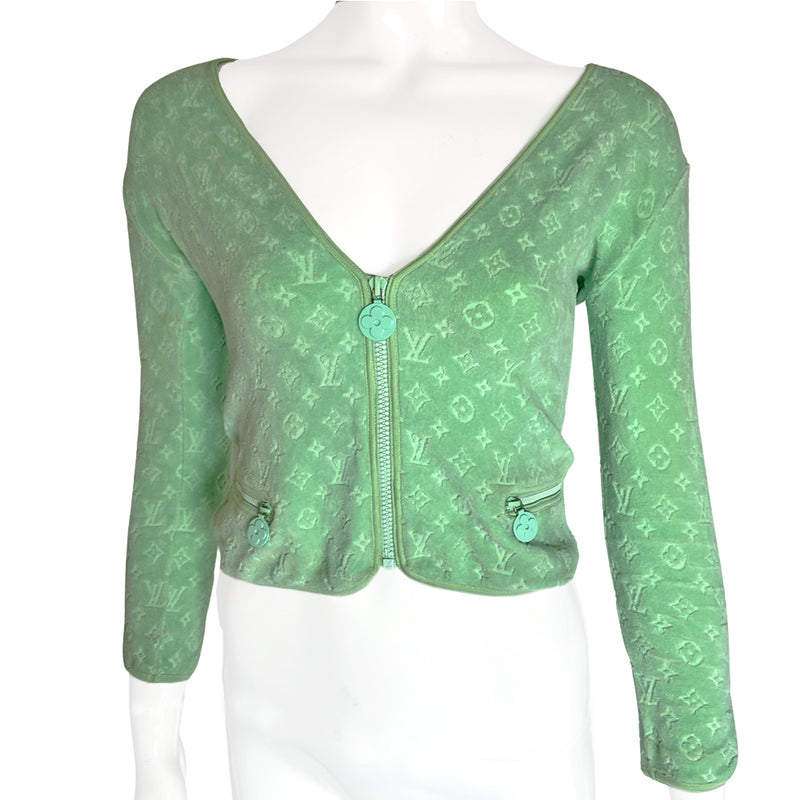 Louis Vuitton mint color all over embossed monogram velour jacket by Marc Jacobs for Louis Vuitton with deep V neckline, tonal front zip closure and logo flower zipper pulls. 2 matching vertical side zip pockets and slit sleeves. Made in France 