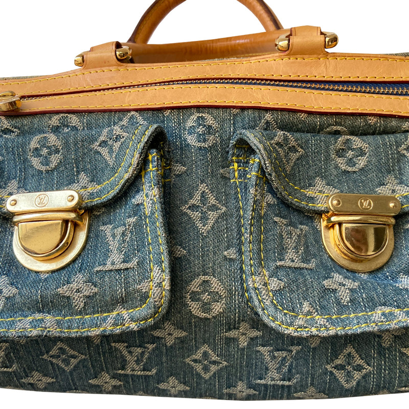 Louis Vuitton blue stonewashed monogram denim Neo Speedy Bag by Marc Jacobs for Louis Vuitton, 2005. 2 outer front pockets with gold-tone push lock closures and outer zip pocket. Vachetta leather trimmed with 2 rolled leather handles. Top zipper closure opens to gold/tan alcantara lining, one interior slip pocket. Made in France