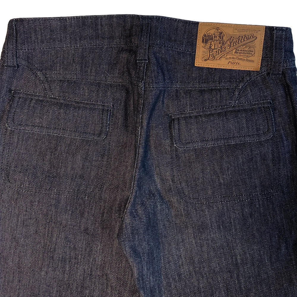 Louis Vuitton Multicolore Monogram crop jeans by Takashi Murakami for Louis Vuitton, mid 2000’s. Mid-rise 5 pocket blue/black denim with black multicolor monogram accents at front pockets, interior waist band, under rear flap pockets and at bottom fold-up cuffs. Made in Italy 