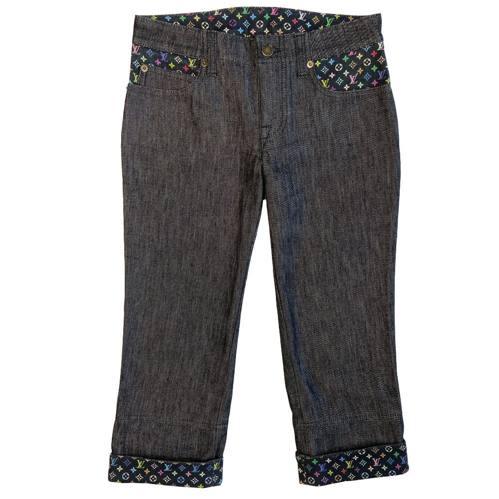 Louis Vuitton Multicolore Monogram crop jeans by Takashi Murakami for Louis Vuitton, mid 2000’s. Mid-rise 5 pocket blue/black denim with black multicolor monogram accents at front pockets, interior waist band, under rear flap pockets and at bottom fold-up cuffs. Made in Italy 