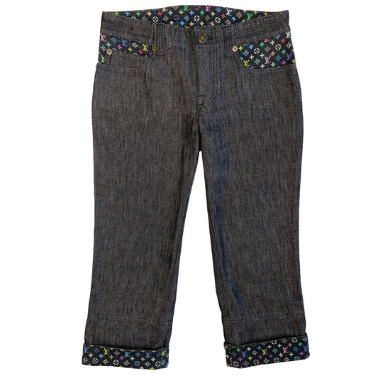 Louis Vuitton Multicolore Monogram crop jeans by Takashi Murakami for Louis Vuitton, mid 2000’s. Mid-rise 5 pocket blue/black denim with black multicolor monogram accents at front pockets, interior waist band, under rear flap pockets and at bottom fold-up cuffs. Made in Italy 