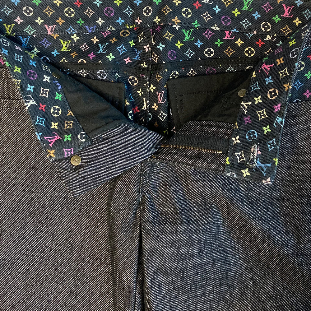 Louis Vuitton Multicolore Monogram crop jeans by Takashi Murakami for Louis Vuitton, mid 2000’s. Mid-rise 5 pocket blue/black denim with black multicolor monogram accents at front pockets, interior waist band, under rear flap pockets and at bottom fold-up cuffs. Made in Italy 