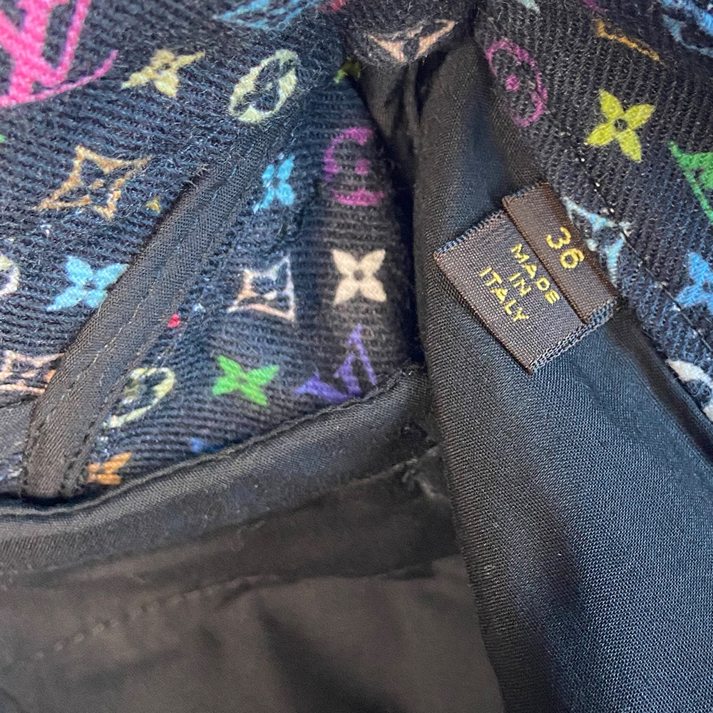 Louis Vuitton Multicolore Monogram crop jeans by Takashi Murakami for Louis Vuitton, mid 2000’s. Mid-rise 5 pocket blue/black denim with black multicolor monogram accents at front pockets, interior waist band, under rear flap pockets and at bottom fold-up cuffs. Made in Italy 