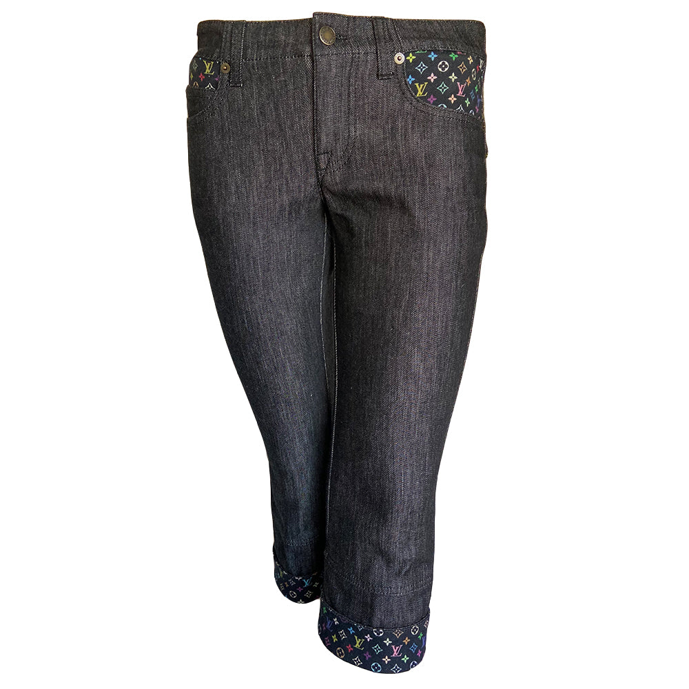 Louis Vuitton Multicolore Monogram crop jeans by Takashi Murakami for Louis Vuitton, mid 2000’s. Mid-rise 5 pocket blue/black denim with black multicolor monogram accents at front pockets, interior waist band, under rear flap pockets and at bottom fold-up cuffs. Made in Italy 