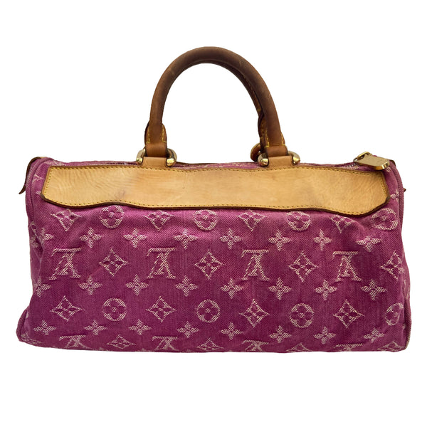 Louis Vuitton pink denim Neo Speedy Bag by Marc Jacobs for Louis Vuitton, 2005. 2 outer front pockets, gold-tone push lock closure, contrast stitching. Vachetta leather trimmed exterior, zippered pocket, 2 rolled vachetta leather handles. Top zipper, pink alcantara lining, interior slip pocket. Date code is visible. Made in France 
