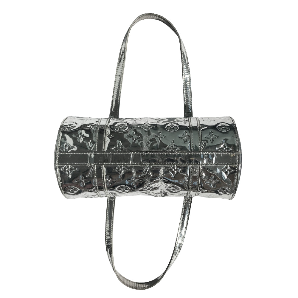 Louis Vuitton Miroir Papillon limited Marc Jacobs for Louis Vuitton, FW runway 2006. Brilliant silver-tone monogram mirrored vinyl body, 2 mirrored flat leather top handles & trim, exterior slip pocket at one end, top zipper closure, mirrored leather zipper pull, grey canvas interior. Date code: MB1016. Made in France 