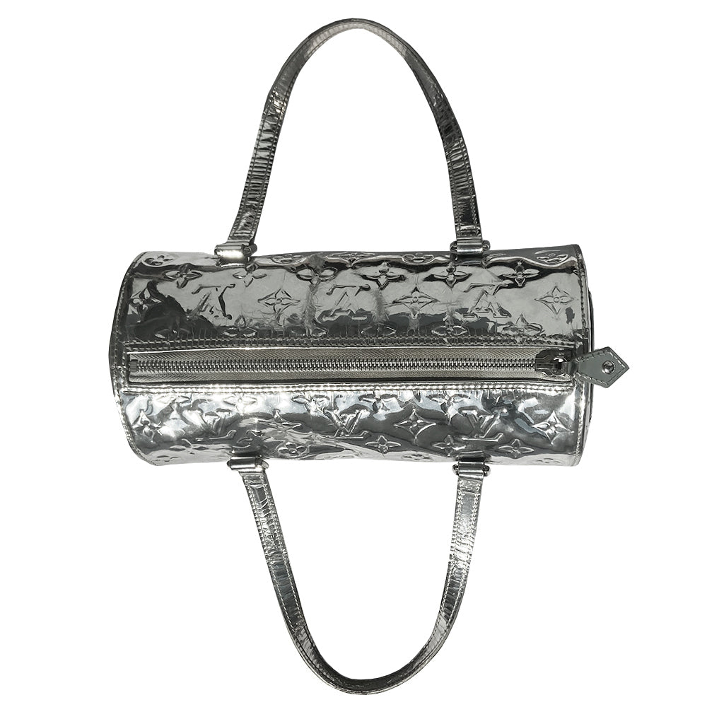 Louis Vuitton Miroir Papillon limited Marc Jacobs for Louis Vuitton, FW runway 2006. Brilliant silver-tone monogram mirrored vinyl body, 2 mirrored flat leather top handles & trim, exterior slip pocket at one end, top zipper closure, mirrored leather zipper pull, grey canvas interior. Date code: MB1016. Made in France 