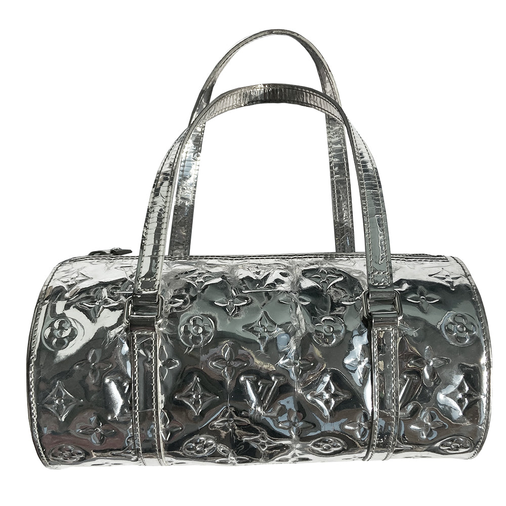Louis Vuitton Miroir Papillon limited Marc Jacobs for Louis Vuitton, FW runway 2006. Brilliant silver-tone monogram mirrored vinyl body, 2 mirrored flat leather top handles & trim, exterior slip pocket at one end, top zipper closure, mirrored leather zipper pull, grey canvas interior. Date code: MB1016. Made in France 