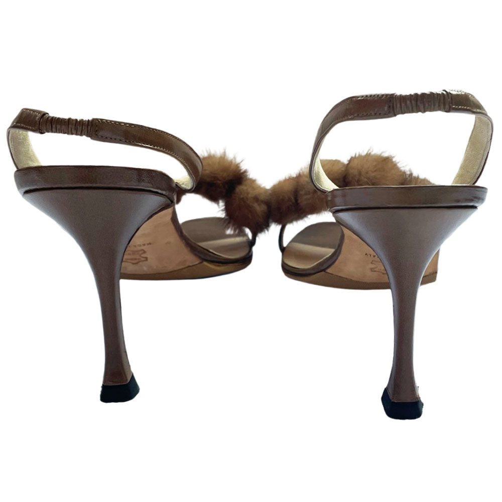 Manolo Blahnik bronze leather strappy heels with 4 mink pom-pom embellishments across the toe strap, slip-on elastic heel strap, open toe. Made in Italy 