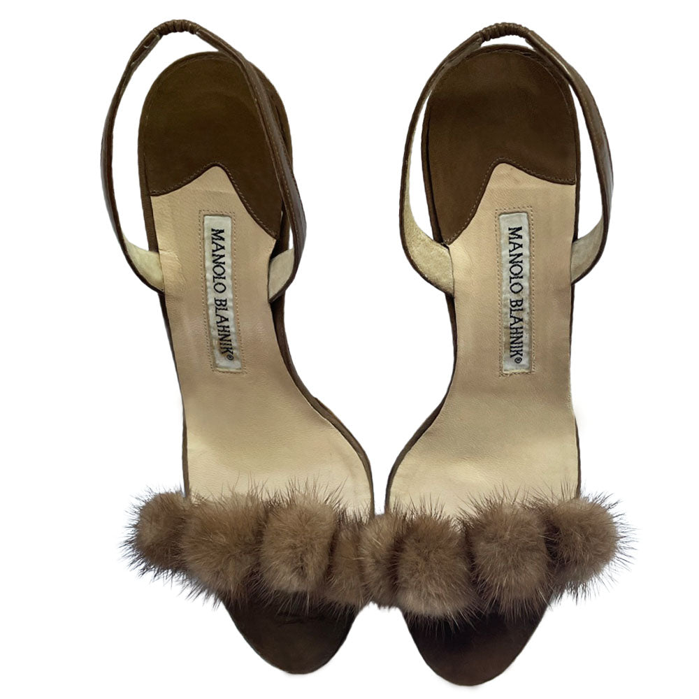 Manolo Blahnik bronze leather strappy heels with 4 mink pom-pom embellishments across the toe strap, slip-on elastic heel strap, open toe. Made in Italy 