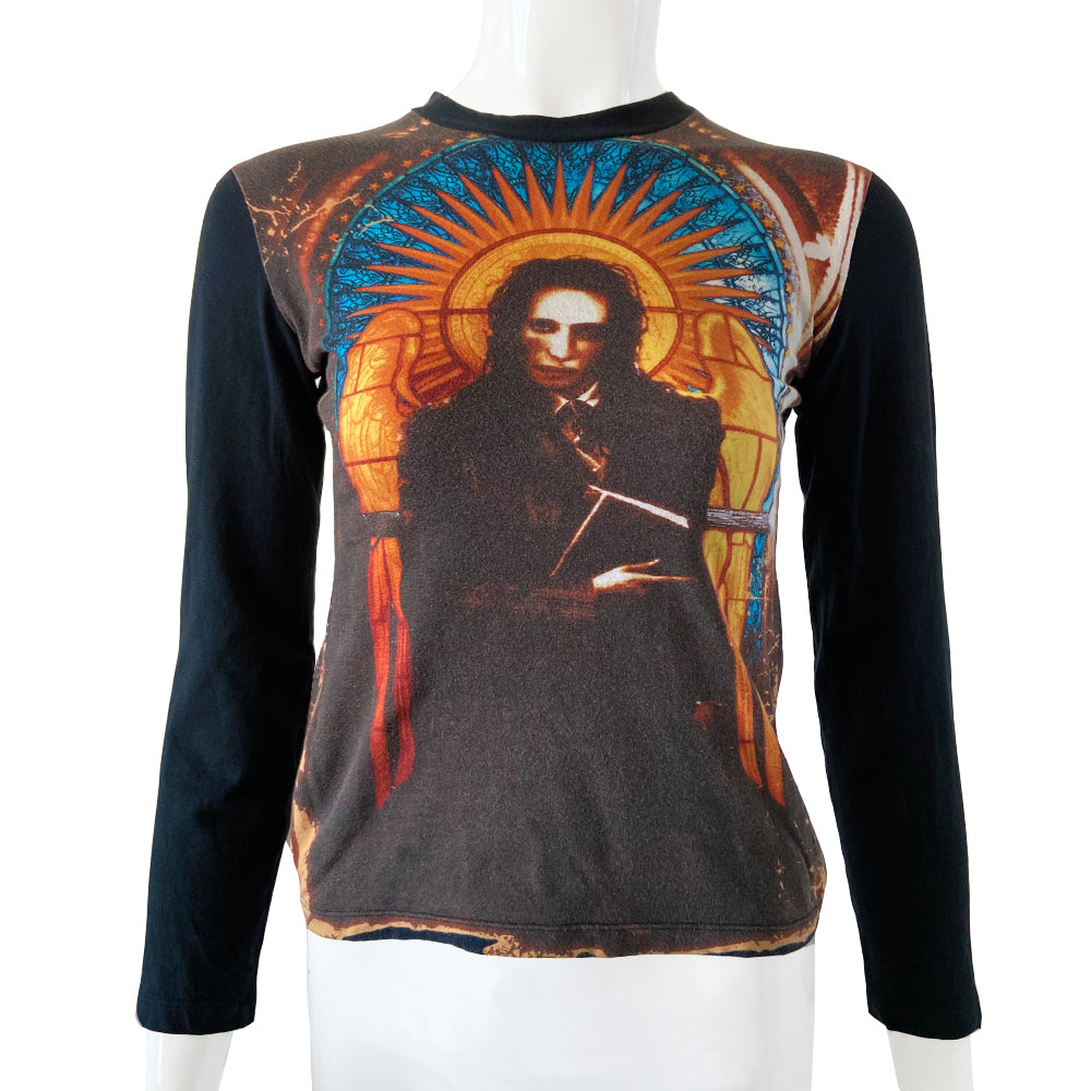 Jean Paul Gaultier long sleeved tee from Spring 1998 featuring Marilyn Manson against stained glass church window background on front and back. Tag size: 40 Main Color: Black. Made in Japan 
