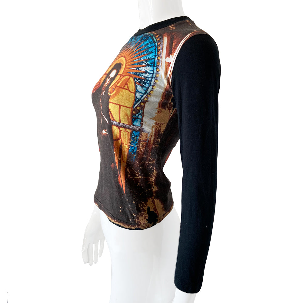 Jean Paul Gaultier long sleeved tee from Spring 1998 featuring Marilyn Manson against stained glass church window background on front and back. Tag size: 40 Main Color: Black. Made in Japan 