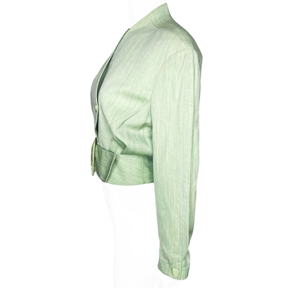 Thierry Mugler 1980's seafoam green wool jacket with angled front flap featuring the iconic Mugler wave, green acetate belt and triangle buttons. Three front snap closures, two at waist and one at chest, back pleats and blouson body. Made in France 