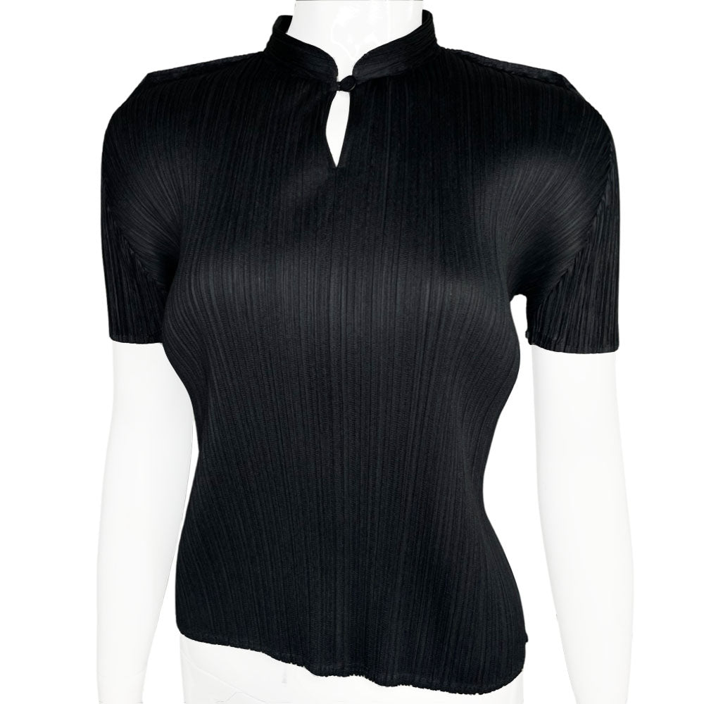 Issey Miyake Pleats Please black finely pleated short sleeve top circa 1990's with single top button with keyhole opening. Made in Japan 