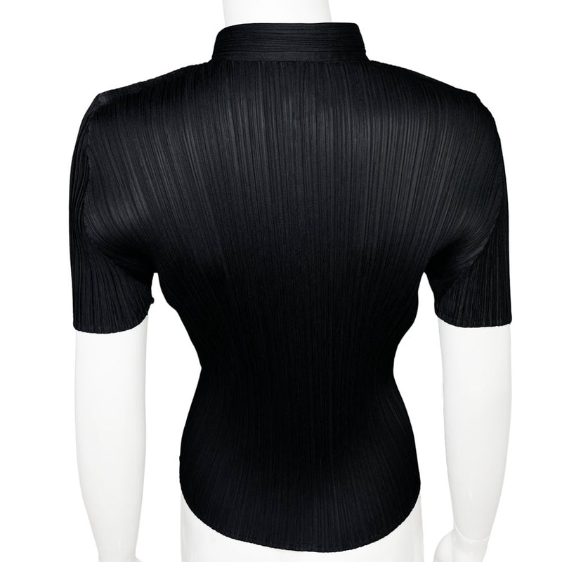 Issey Miyake Pleats Please black finely pleated short sleeve top circa 1990's with single top button with keyhole opening. Made in Japan 