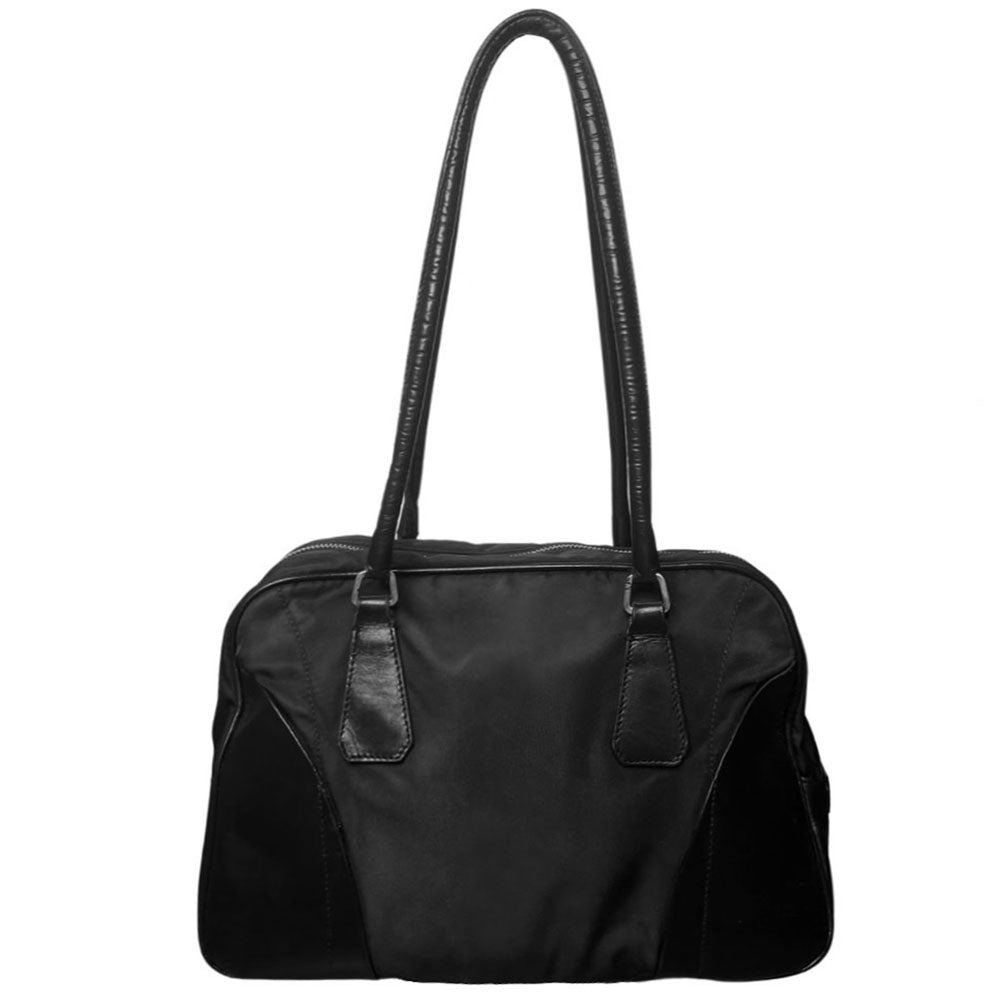 Prada tessuto Shoulder Bag Circa 2000's, black nylon bag with leather handles, front panels and piping, front logo plaque. Zip closure with silver-tone YKK zipper pull opens to black jacquard logo lining, one interior pocket. Made in Italy 