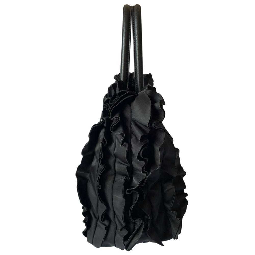 Prada 2000s black ruffled body tessuto nylon tote with leather handles, accent and hanging clochette key holder featuring gold-tone logo. Gold-tone hardware, interior logo, zippers and logo engraved feet. Magnetic snap closure, interior trademark leather label, 2 interior zip pockets, Prada logo lining. Made in Italy 