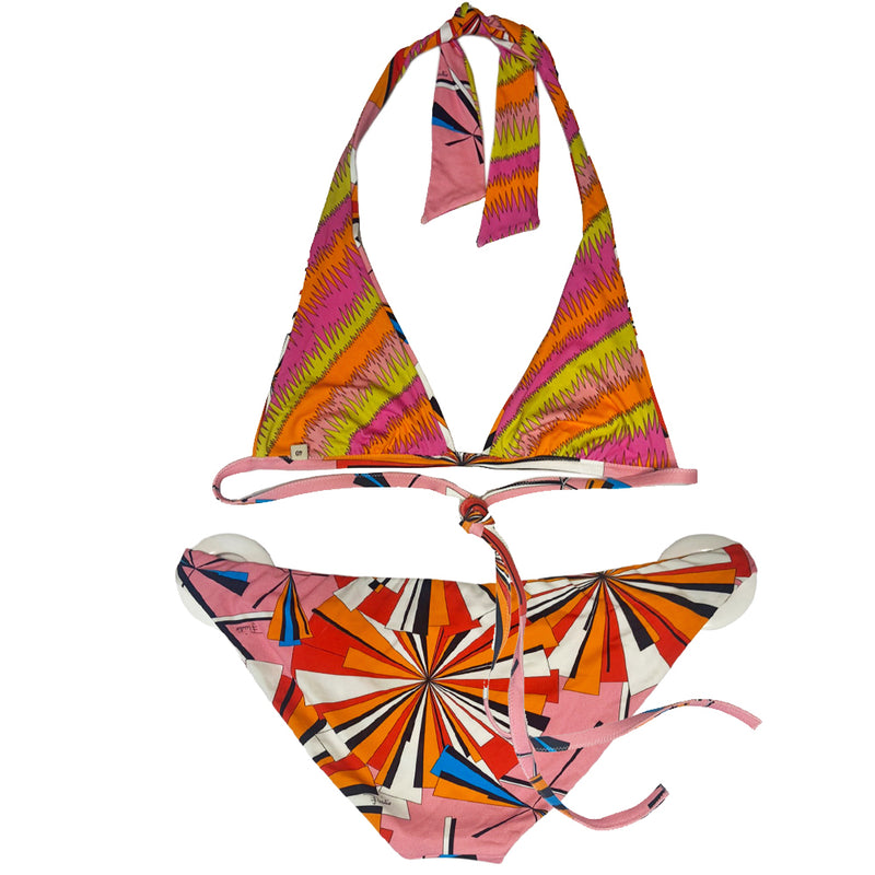 Pucci multicolor geometric pattern pink/orange/yellow/red/blue bikini with halter top that ties around neck and in back and mid rise bottoms featuring 2 oversized white plastic ring attachments that embellish each side. Made in Italy