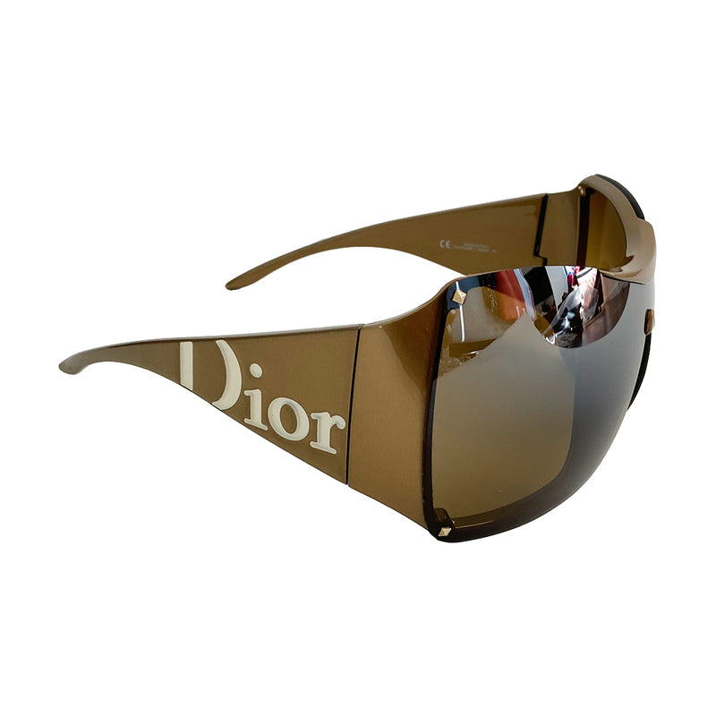 Christian Dior Overshine 1 sunglasses circa early to mid 2000’s. Excellent condition, no scratching on lenses. Oversized solid brown tint lenses, squared rims, gold colored frame with wide arms and Dior name embossed in white on each arm. Style: N6SKB 110 Case and cleaning cloth included. Case shows signs of wear