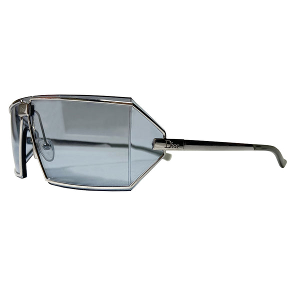 Christian Dior Troika blue lens sunglasses circa 1990’s. Futuristic rectangular shape silver-tone frame and lens that wrap around to the side with Dior engraved logo in center, silver-tone arms with engraved Dior logo at temple. Included: Box, case, soft case, cleaning cloth Condition: Made in Austria 
