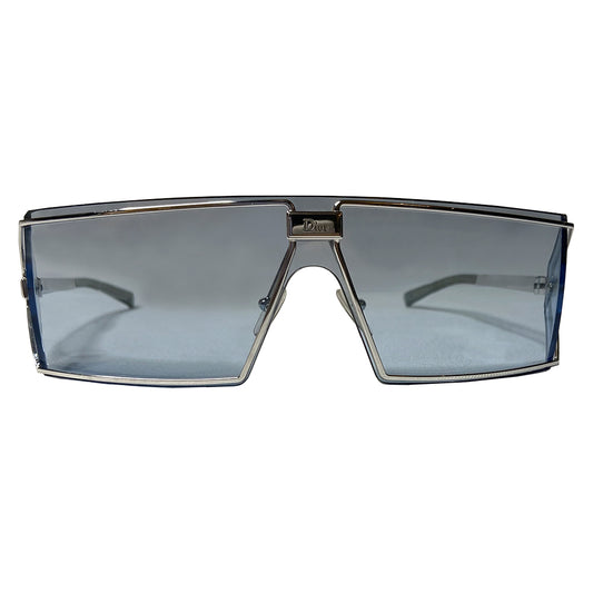 Christian Dior Troika blue lens sunglasses circa 1990’s. Futuristic rectangular shape silver-tone frame and lens that wrap around to the side with Dior engraved logo in center, silver-tone arms with engraved Dior logo at temple. Included: Box, case, soft case, cleaning cloth Condition: Made in Austria 