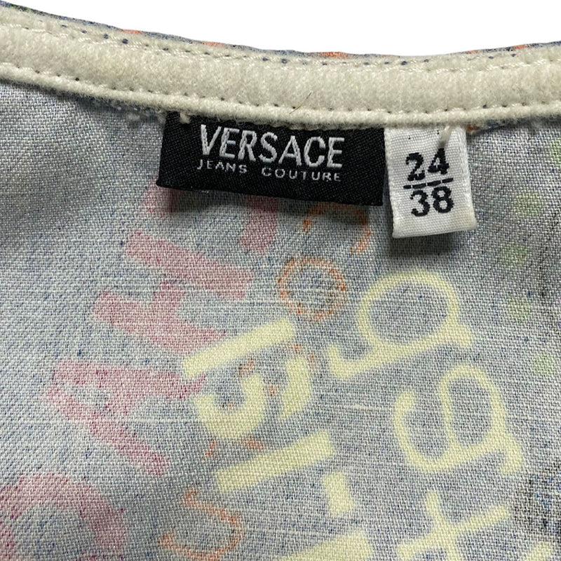 Versace Jeans Couture 1990's blue, pink, orange, yellow printed dress featuring butterflies & graffiti with a light weight denim bodice, adjustable straps, silver tone front zip,  invisible side zip for fit, boning in cups. Angled printed chiffon skirt with solid navy chiffon lining. Butterfly patch in back, silver-tone studs.  Made in Italy 