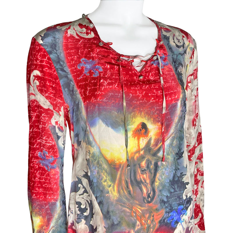 90's cult London label, Voyage long sleeve 100% silk unicorn print shirt featuring all over script print on arms and bell sleeves. Crossed lacing at front neckline, decorated with Swarovski embellished buttons around the collar. 